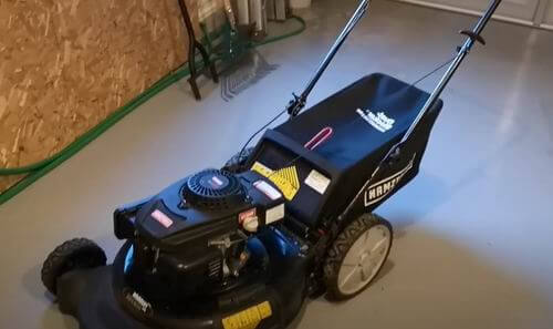 is it safe to store lawn mower in garage